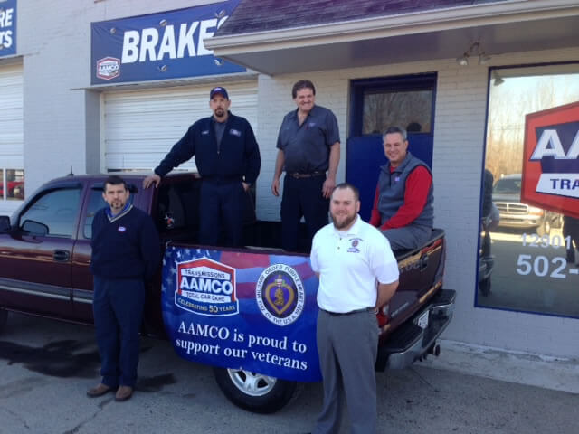 AAMCO Louisville KY owner John Summers veteran Travis Tiffany and repair team